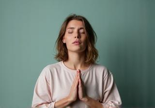 Image representing stress management, showing a calm person or relaxing scene.
